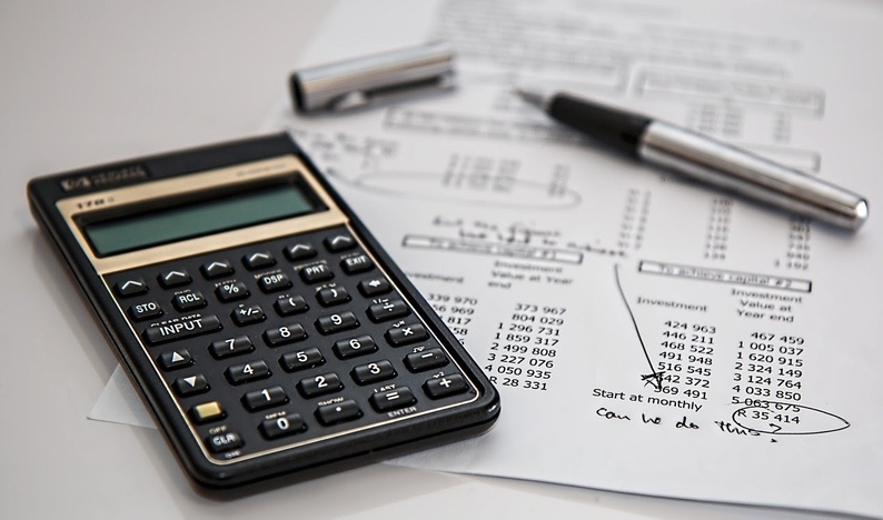 calculator and printed financial accounts