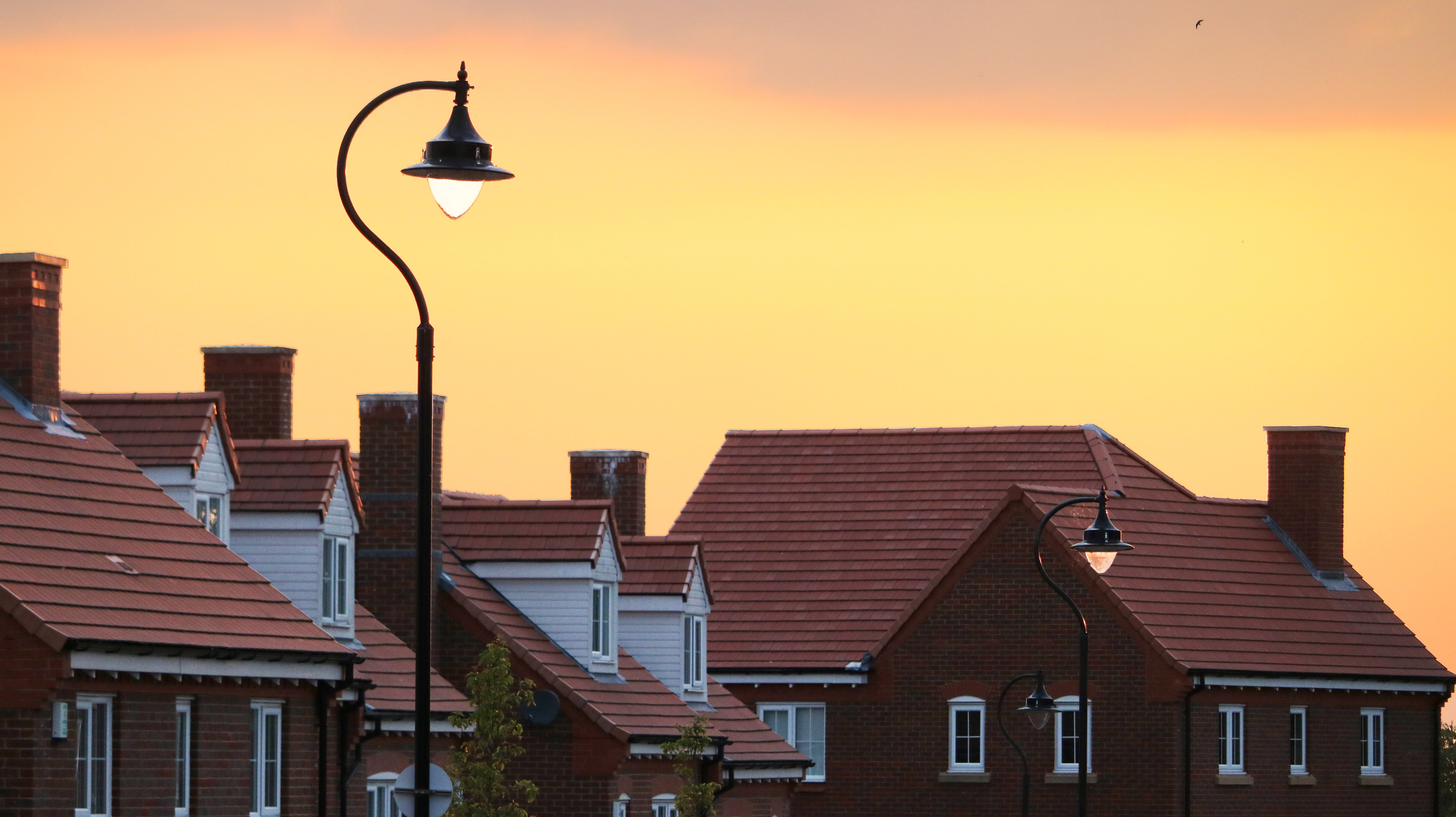 A sunset over a typical English street