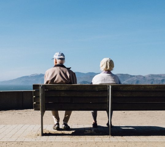 Elderly people on a bench