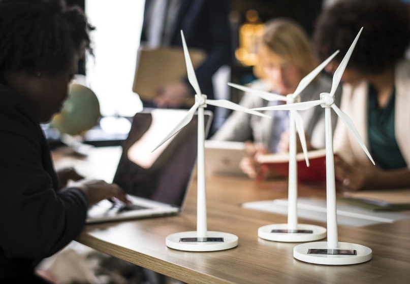 models of wind turbines on a desk