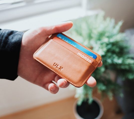 wallet in person's hand