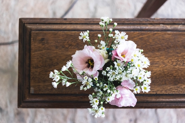 funeral flowers on a coffin